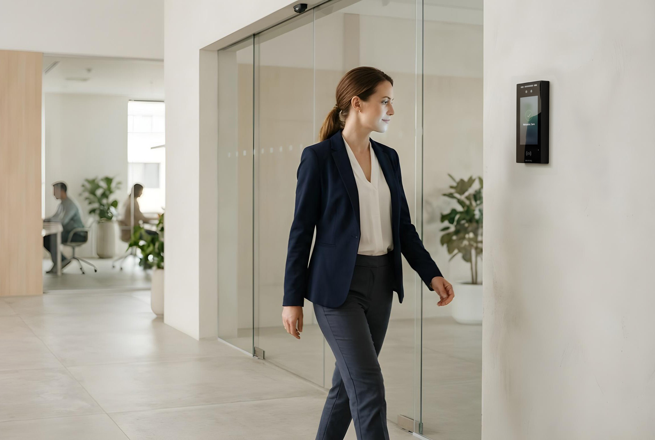 A team moving through a busy office entryway